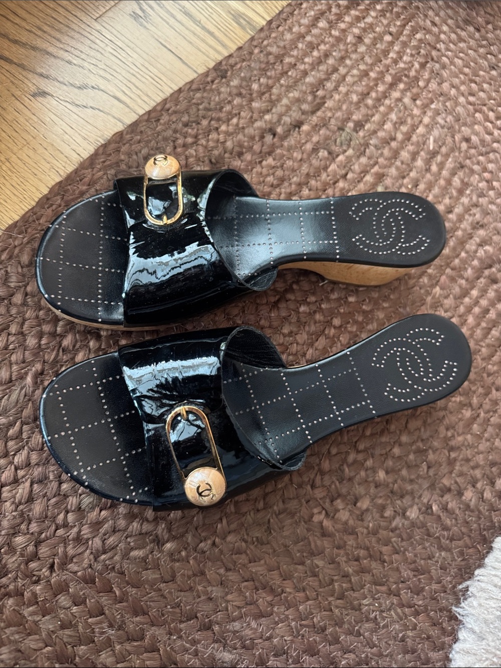 CHANEL Black Patent Leather Slide Mules with Gold CC Accent